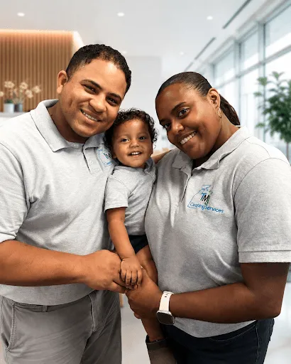 Torrance and Mical Johnson, the husband-and-wife founders of TMJ Cleaning Services, in matching company shirts.